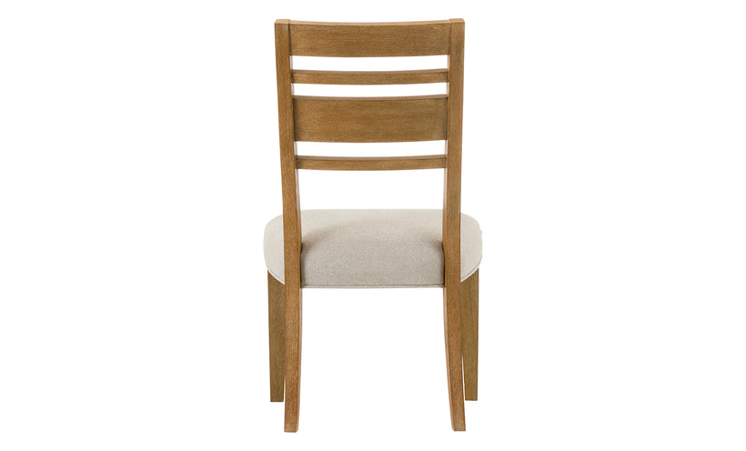 Wooden chair with a beige cushion on a white background